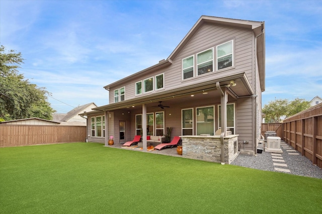 1120 Wakefield Dr, Houston, TX 77018 - back of property with a fenced backyard, a ceiling fan, and a patio