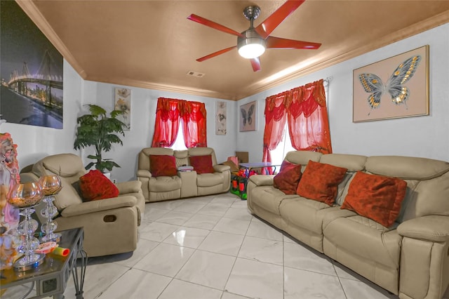 1318 Des Jardines St, Houston, TX 77023 - living area with ornamental molding, a ceiling fan, and marble look tile flooring