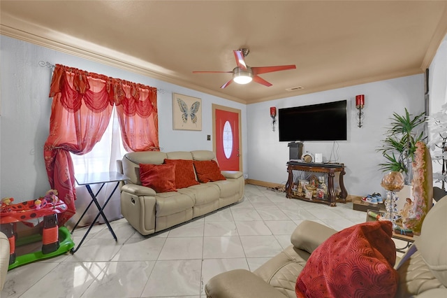 1318 Des Jardines St, Houston, TX 77023 - living room with ceiling fan, crown molding, and healthy amount of natural light