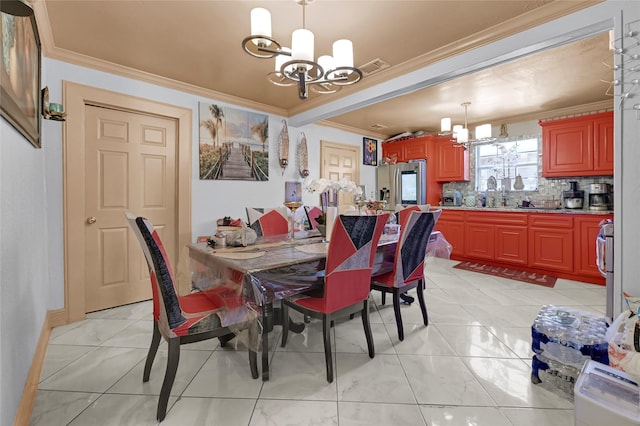 1318 Des Jardines St, Houston, TX 77023 - dining room with a chandelier, ornamental molding, and light marble finish floors
