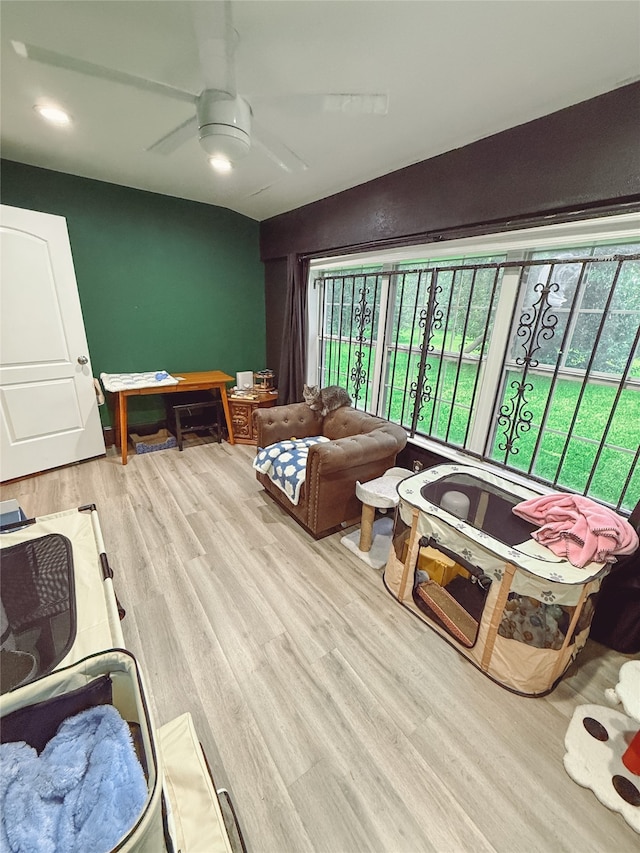 5205 Kashmere St, Houston, TX 77026 - living room featuring plenty of natural light, wood finished floors, a ceiling fan, and recessed lighting