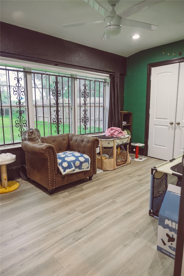 5205 Kashmere St, Houston, TX 77026 - living area featuring healthy amount of natural light, light wood finished floors, a ceiling fan, and recessed lighting