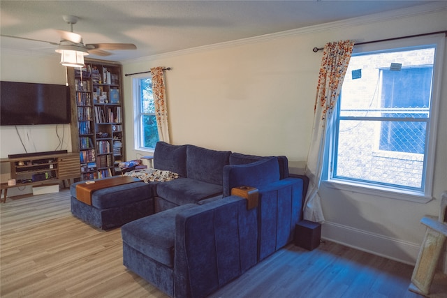 5205 Kashmere St, Houston, TX 77026 - living area with light wood-style floors, crown molding, and ceiling fan