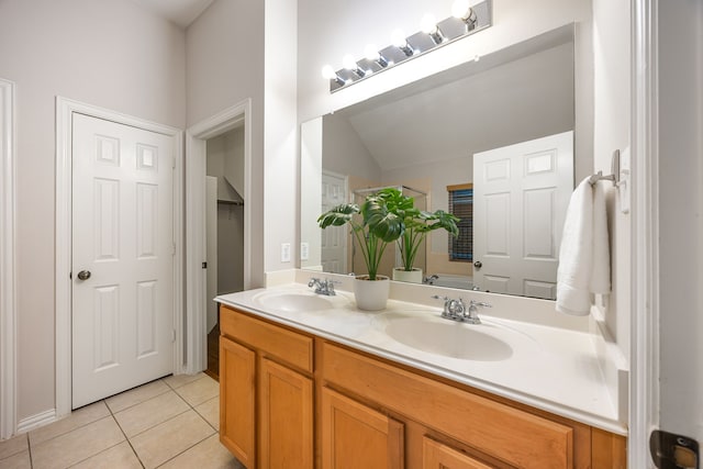 18419 S Raven Shore Dr, Cypress, TX 77433 - full bathroom featuring double vanity, tile patterned flooring, a shower with shower door, and vaulted ceiling
