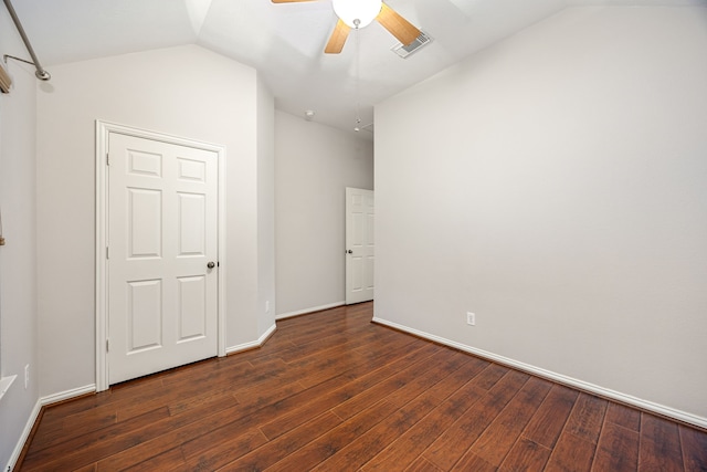 18419 S Raven Shore Dr, Cypress, TX 77433 - unfurnished bedroom with lofted ceiling, dark wood-type flooring, and ceiling fan