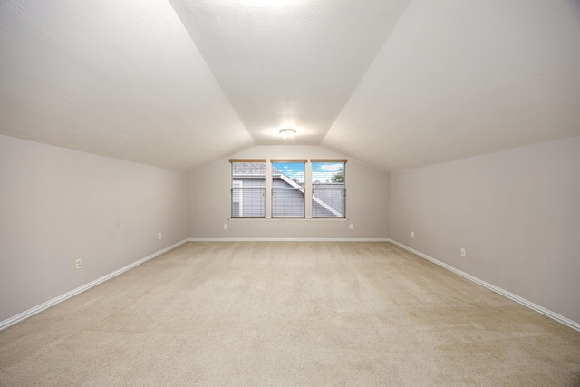 18419 S Raven Shore Dr, Cypress, TX 77433 - bonus room featuring light colored carpet and vaulted ceiling