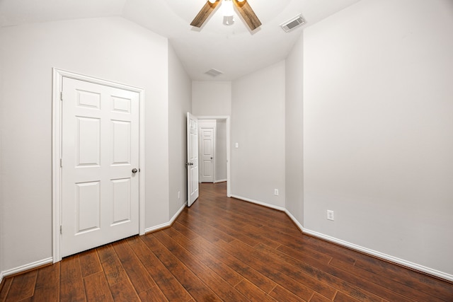 18419 S Raven Shore Dr, Cypress, TX 77433 - unfurnished bedroom featuring dark wood finished floors, a ceiling fan, and vaulted ceiling