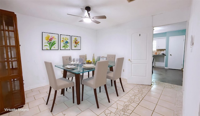 9518 Langdon Ln, Houston, TX 77036 - dining area featuring a ceiling fan