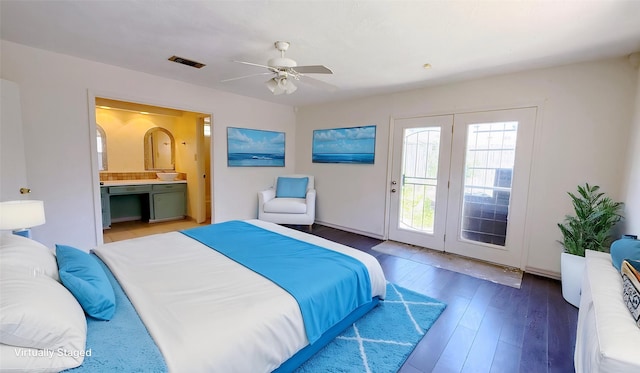 9518 Langdon Ln, Houston, TX 77036 - bedroom featuring access to outside, ensuite bath, wood finished floors, and a ceiling fan