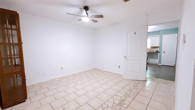 9518 Langdon Ln, Houston, TX 77036 - unfurnished room with a ceiling fan and light tile patterned floors