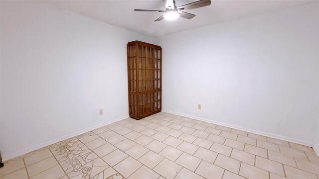 9518 Langdon Ln, Houston, TX 77036 - empty room featuring a ceiling fan and light tile patterned floors