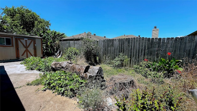 9518 Langdon Ln, Houston, TX 77036 - view of yard featuring a storage shed