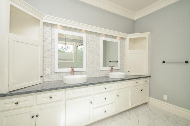 626 E 22nd St, Houston, TX 77008 - full bath with double vanity, ornamental molding, tasteful backsplash, and marble finish floors