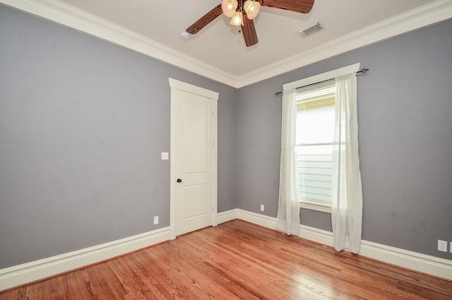 626 E 22nd St, Houston, TX 77008 - empty room with a ceiling fan, crown molding, light wood-style floors, and a smoke detector