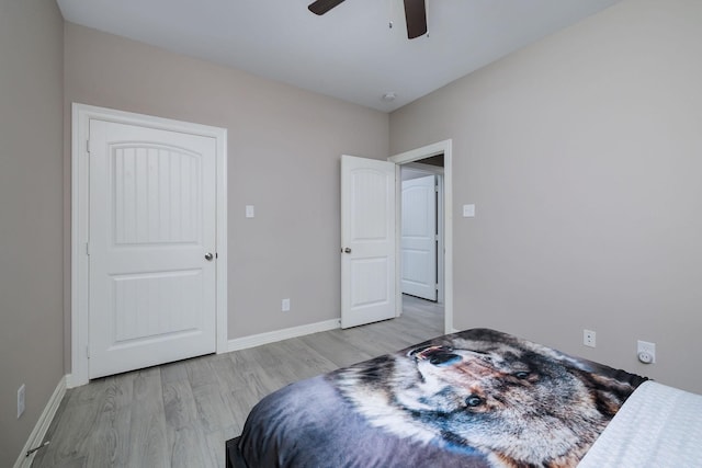 5 Corkwood Rd, Trinity, TX 75862 - bedroom featuring light wood finished floors and ceiling fan