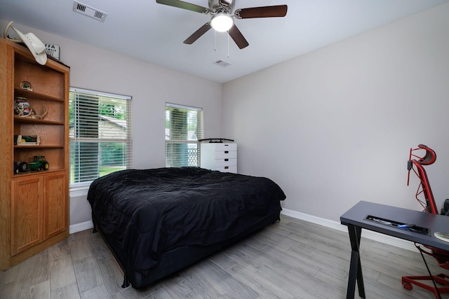 5 Corkwood Rd, Trinity, TX 75862 - bedroom with a ceiling fan and light wood-type flooring