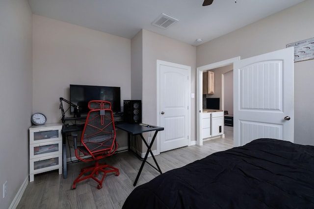 5 Corkwood Rd, Trinity, TX 75862 - bedroom featuring light wood-style flooring and ceiling fan