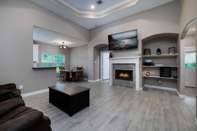 5 Corkwood Rd, Trinity, TX 75862 - living area with a fireplace, ornamental molding, plenty of natural light, light wood-type flooring, and recessed lighting
