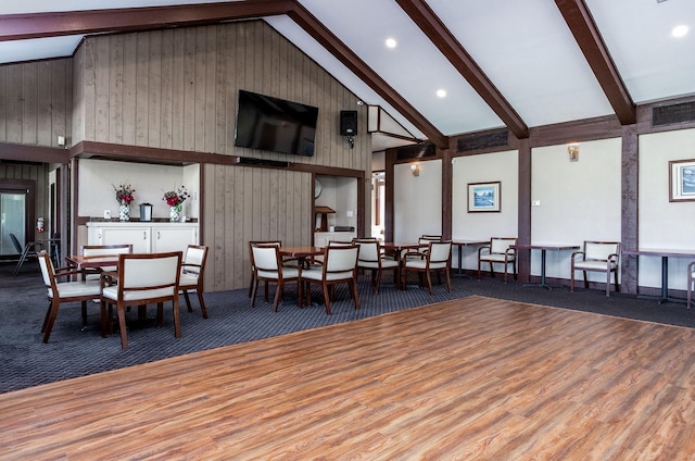 5 Corkwood Rd, Trinity, TX 75862 - carpeted dining area featuring high vaulted ceiling, beam ceiling, wood finished floors, recessed lighting, and wood walls