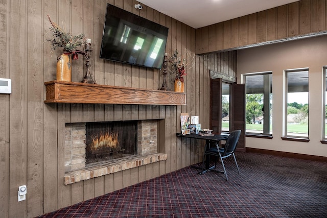 5 Corkwood Rd, Trinity, TX 75862 - carpeted office with wooden walls and a brick fireplace