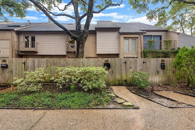 5830 Sampley Way Unit 5830, Houston, TX 77092 - view of side of property featuring brick siding and a shingled roof