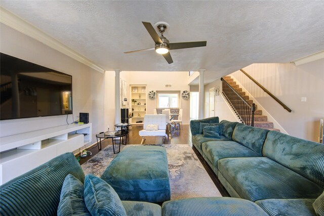 5830 Sampley Way Unit 5830, Houston, TX 77092 - living area featuring wood finished floors, ceiling fan, a textured ceiling, stairway, and crown molding