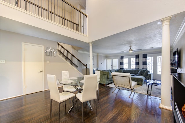 5830 Sampley Way Unit 5830, Houston, TX 77092 - dining room with decorative columns, ceiling fan, wood finished floors, ornamental molding, and a high ceiling