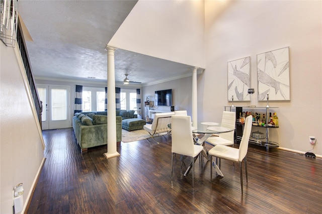 5830 Sampley Way Unit 5830, Houston, TX 77092 - dining room featuring ornate columns, ornamental molding, wood finished floors, and ceiling fan