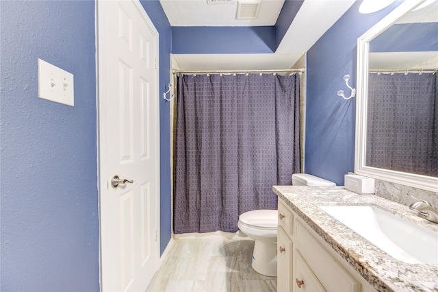 5830 Sampley Way Unit 5830, Houston, TX 77092 - bathroom featuring a textured wall, vanity, and a shower with curtain