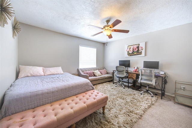 5830 Sampley Way Unit 5830, Houston, TX 77092 - carpeted bedroom featuring a ceiling fan, an office area, and a textured ceiling