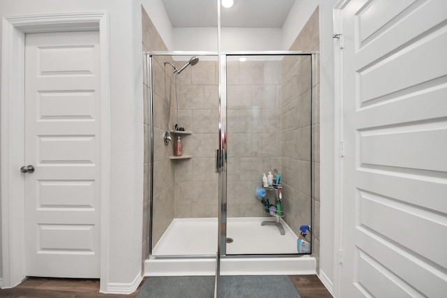 23238 Spring Genesis Ln, Katy, TX 77493 - full bathroom featuring a stall shower and wood finished floors