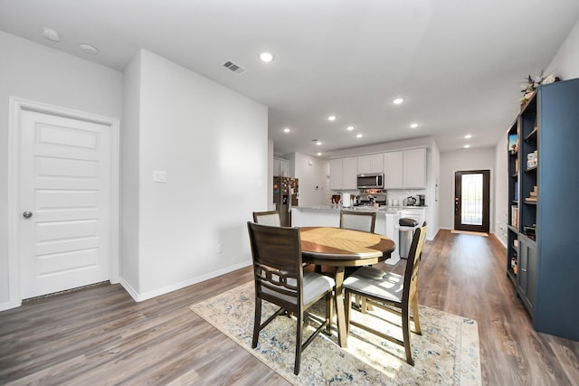 23238 Spring Genesis Ln, Katy, TX 77493 - dining area with wood finished floors and recessed lighting