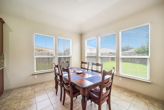 2614 Maverick Park Ln, Katy, TX 77449 - dining room featuring baseboards and light tile patterned flooring
