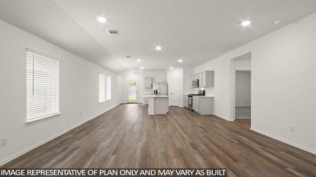 546 Belle Springs Ln, Conroe, TX 77301 - unfurnished living room featuring dark wood finished floors and recessed lighting