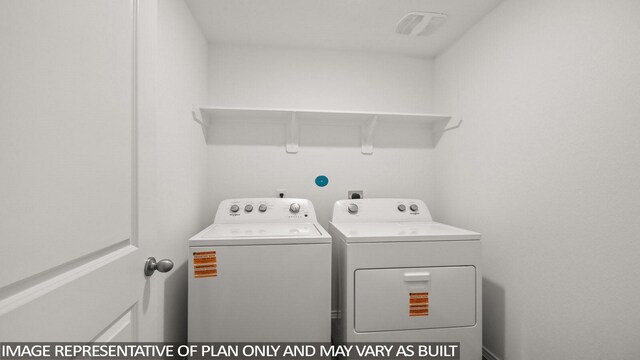 546 Belle Springs Ln, Conroe, TX 77301 - washroom featuring washing machine and clothes dryer
