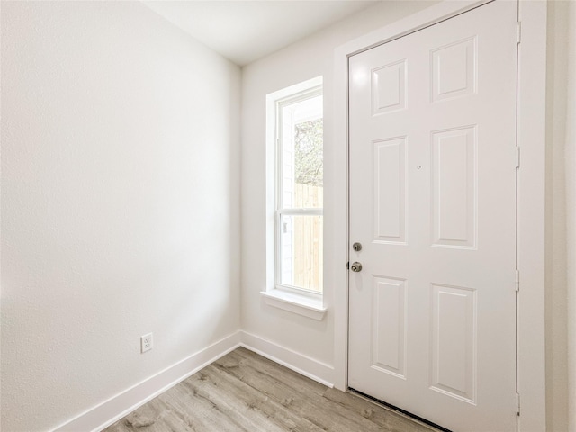 11514 Courtshire Rd, Houston, TX 77076 - entryway featuring light wood-style flooring and baseboards