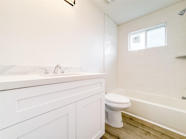 11514 Courtshire Rd, Houston, TX 77076 - bathroom with wood finished floors, vanity, and washtub / shower combination