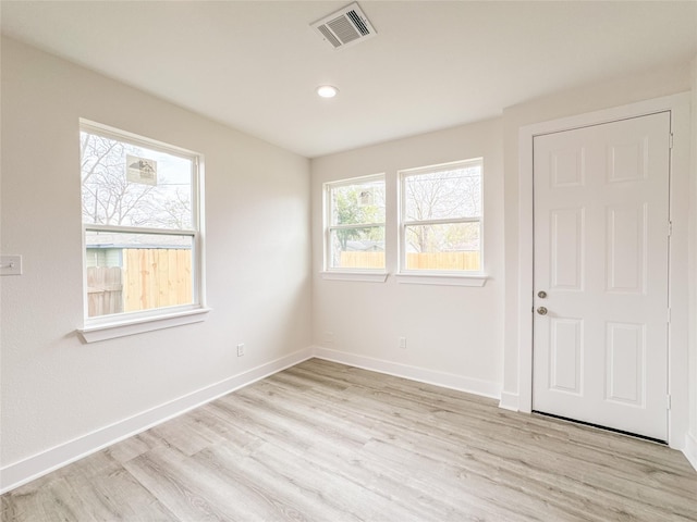 11514 Courtshire Rd, Houston, TX 77076 - empty room with light wood finished floors and recessed lighting