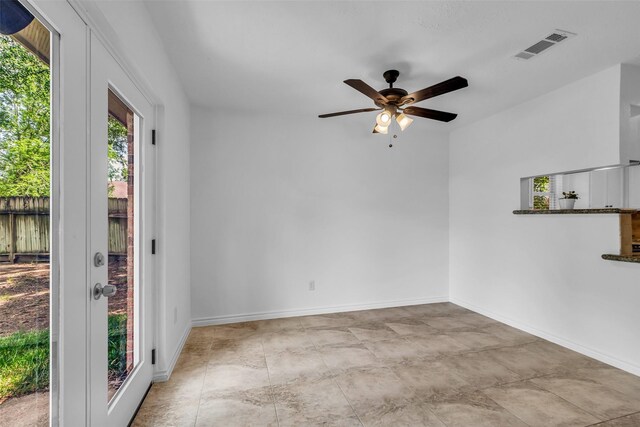 9410 Chapel Pine Ct, Spring, TX 77379 - spare room featuring a ceiling fan and baseboards