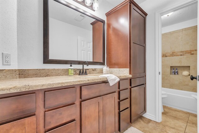 9410 Chapel Pine Ct, Spring, TX 77379 - full bathroom featuring vanity, tile patterned flooring, and shower / bath combination