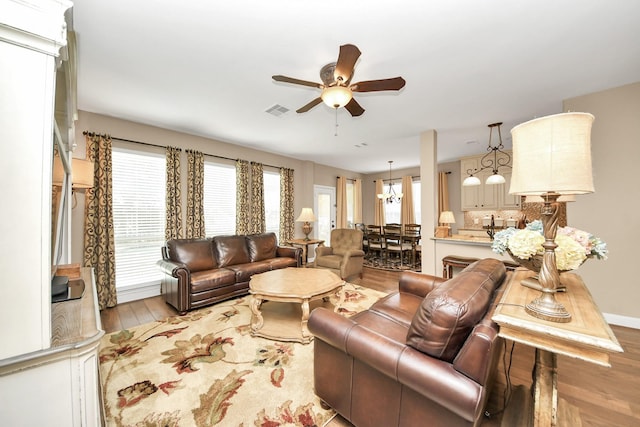 6111 Meadowstream Ct, Katy, TX 77450 - living room with ceiling fan and wood finished floors