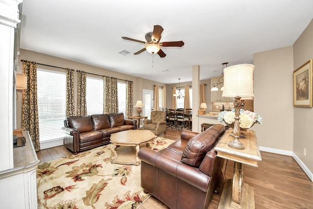 6111 Meadowstream Ct, Katy, TX 77450 - living area with ceiling fan and wood finished floors