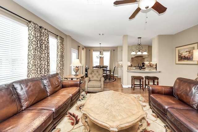 6111 Meadowstream Ct, Katy, TX 77450 - living room featuring ceiling fan and wood finished floors