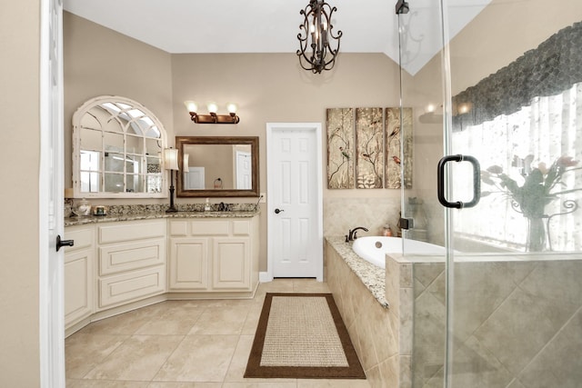 6111 Meadowstream Ct, Katy, TX 77450 - full bathroom with tile patterned flooring, vanity, a garden tub, and a shower stall