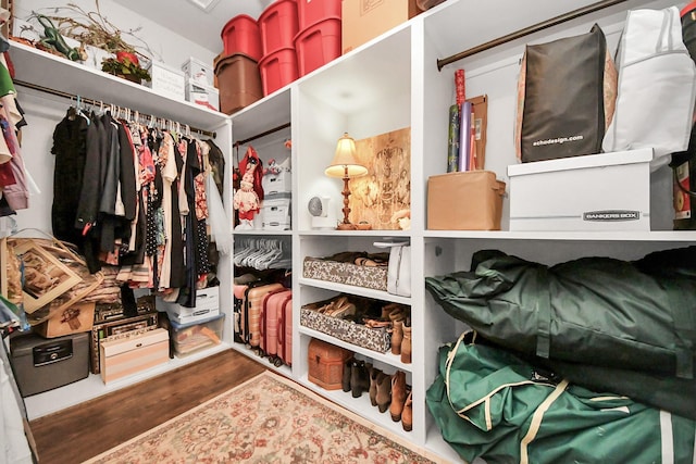 6111 Meadowstream Ct, Katy, TX 77450 - spacious closet featuring wood finished floors