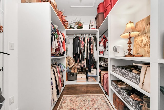 6111 Meadowstream Ct, Katy, TX 77450 - walk in closet featuring wood finished floors