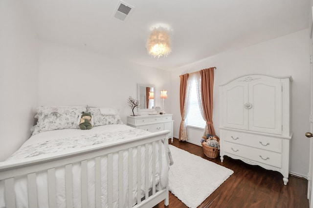 6111 Meadowstream Ct, Katy, TX 77450 - bedroom with dark wood-style flooring
