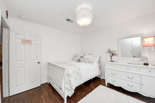 6111 Meadowstream Ct, Katy, TX 77450 - bedroom featuring a chandelier and dark wood finished floors