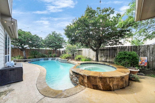 6111 Meadowstream Ct, Katy, TX 77450 - view of swimming pool featuring a fenced backyard, a pool with connected hot tub, and a patio