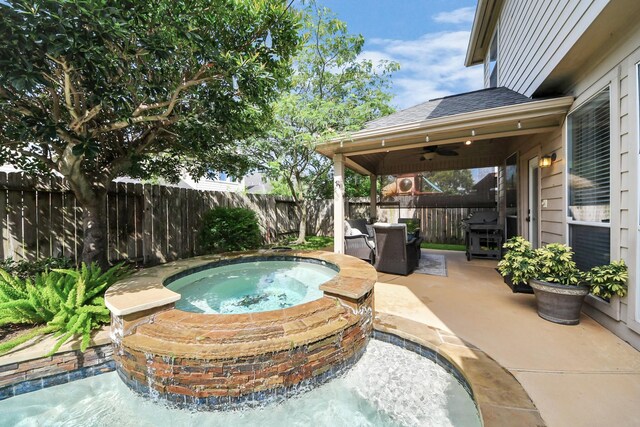 6111 Meadowstream Ct, Katy, TX 77450 - view of pool with a ceiling fan, grilling area, a fenced backyard, a patio, and a pool with connected hot tub
